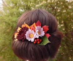 Floral hair piece (hair comb) with burgundy and pink chrysanthemum, and fall leaves. Total length is 6'' (15 cm). Each of them made of foam material. Every flower detail and the assembly are carefully handmade done. The flower hairpiece will be placed into a GIFT BOX. Unlike real, foam flowers have the following BENEFITS: - Don't crumple. It recovers even if you crushed a flower in your hand. You can place it in your handbag, and it cannot be broken. Take it out your bag and do petals straight. - Moisture, sunlight and cold resist. Even if you got in the rain or spent a long time under sunlight or cold weather, colors and flowers form will not be changed. - Pleased by touch, because of delicate and soft material. Will not broke after falling down. - Safe for children and adults. Not contai Fall Wedding Hair, Fall Leaf Wedding, Wedding Flower Hair Pieces, Red Orange Hair, Floral Hair Piece, Fall Wedding Hairstyles, Autumn Hair, Floral Hair Pieces, Flower Hair Pieces