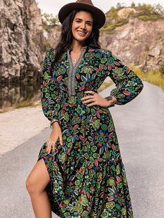 Effortlessly turn heads in our Enchanted Bloom Dress, featuring a stunning V-neck and eye-catching lantern sleeves. The vibrant print adds a touch of charm, while the flowy silhouette flatters all body types. Elevate your style with our must-have stunner. Color : Green Style : Boho Pattern Type : Floral, All Over Print Type : A Line Details : Contrast Lace, Knot, Ruffle Hem Neckline : Tie Neck Sleeve Length : Long Sleeve Sleeve Type : Bishop Sleeve Fit Type : Loose Length : Long Waist Line : Hig Multicolor V-neck Boho Dress With Floral Print, Multicolor Bohemian Dress With Split Neck, Bohemian Multicolor Split Neck Dress, Patterned Floral Print V-neck Boho Dress, Black Boho Print V-neck Dress, Multicolor V-neck Boho Dress For Fall, Flowy Multicolor Print Maxi Dress With V-neck, Bohemian Long Sleeve Multicolor Print Dress, Bohemian V-neck Maxi Dress With Abstract Print