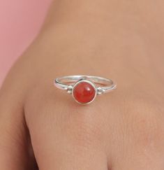 Carnelian Ring, 925 Sterling Silver Ring, Handmade Silver Ring, July Birthstone Ring, Minimalist Gemstone Ring, All Ring Size Available  Gemstone Name - Carnelian Stone Quality - AAA Ring Weight - 2.13 gm Stone Shape - As shown in the picture Ring Size - All Ring Size Available  You'll get the exact product as shown in the pictures We serve complete 925 sterling silver Jewelry and genuine properties of the stone. The products are dispatched from the small business from USA. Product Quality and Packaging - Our all products are 925 Silver Stamped which shows that the product is genuine and authentic .The products are dispatched from the small business from USA so you get the product on time and the product packaging comes in bubble foil wrap with all the precautions taken primarily that your Sterling Silver Stackable Rings With Natural Stones, Carnelian Rings With Natural Stones, Carnelian Natural Stones Round Ring, Picture Ring, July Birthstone Ring, Handmade Silver Ring, Carnelian Ring, Carnelian Stone, Ring Minimalist