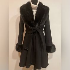 Nwt Donna Salyers' Fabulous Faux Fur Luxury Swing Coat | Extra Small | Black An Effortlessly Elegant Way To Top Off All Of Your Cold-Weather Looks With Faux Fur Collar And Cuffs For Added Feminine Style. Belted Waist. 100% Wool. Nwt With A Vintage Retro Style. - Adjustable Belt - Welt Pockets - Fully Silk Like Lining - Flattering Princess Seams - Pleated Swing Style - Machine Wash, Hang Dry Black Fur Coat With Faux Fur Trim For Winter, Fitted Winter Outerwear With Faux Fur Lining, Fitted Outerwear With Faux Fur Lining For Winter, Fitted Winter Fur Coat For Cold Weather, Fitted Fur Coat For Cold Winter Weather, Fitted Fur Coat For Winter, Elegant Faux Fur Winter Outerwear, Fitted Fur Coat For Cold Fall Weather, Fitted Long Fur Coat For Cold Weather