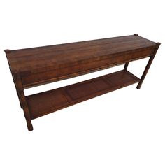 a wooden table with two shelves on each side and one shelf below it that is made out of wood