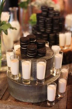 an assortment of cookies and glasses on a table