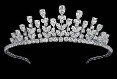 a diamond tiara on a black background