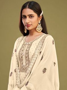 Pretty cream embroidered partywear straight-cut-suit online. Buy this stunning salwar kameez online at the best price in India; express shipping USA, UK, Canada & Worldwide. Traditional Party Wear, Party Wear Salwar, Georgette Material, Beige Suits, Salwar Kameez Online, Indian Suits, Pink Fits, Salwar Kameez Designs, Zari Work