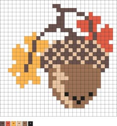 a cross - stitch pattern with an image of a cupcake and leaves on it