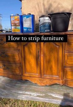 an old dresser has been turned into a sideboard with paint and furniture on it