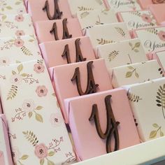 pink and white boxes with chocolate numbers on them