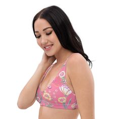 You will love this sweet pink desert flower bikini top! Extra lift provided by removable pads, it's super uncomplicated and easy to wear all day poolside, or even as a supportive layer under a UPF Long Sleeve. Supportive design for active beach days or poolside relaxation Made from sustainable recycled materials Mix and match with other pieces in the collection Provides freedom of movement Imported Size guide CHEST (inches) UNDERBUST (inches) XS 33 ⅛ 28 ¾ S 34 ⅝ 29 ½ M 36 ¼ 30 ¼ L 39 ⅜ 31 ⅞ XL 4 Pink Beachy Swimwear With Built-in Bra, Pink Swimwear With Built-in Bra For Vacation, Pink Beach Swimwear With Padded Cups, Pink Beach Swimwear With Adjustable Straps, Pink Padded Cup Swimwear For Beach, Beach Swimwear With Padded Cups In Pink, Tropical Pink Swimwear With Built-in Bra, Pink Swimwear With Padded Cups For Beach, Pink Triangle Top Bra With Padded Cups