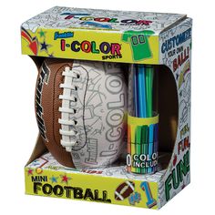 a football in a box with markers, pens and crayons on the inside