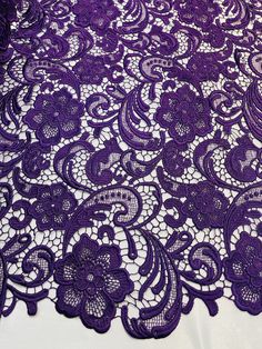 an image of purple lace fabric