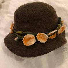 Very Cute Hat! Made Of Felt In Brown Has Attachment Of Floral Strands Of Light Peach With Green Stems One Size Nwt Excellent Condition Spring Hats, Cute Hat, Light Peach, Cute Hats, Felt Hat, Felt, Women Accessories, Hats, Floral