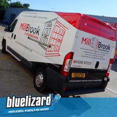 a white and red van parked in a parking lot next to a building with the words millbrock written on it