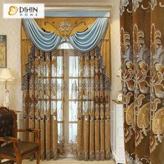 a living room filled with furniture and curtained window coverings in gold, blue and white colors