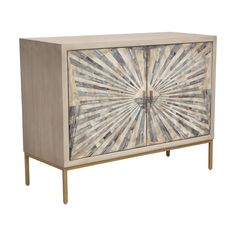 a wooden cabinet with an abstract design on the front and side panels, in grey tones