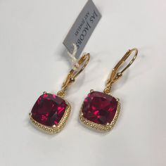 Beautiful Cushion Cut Ruby Earrings * Cushion Cut Ruby measure 10x10mm each * Lever Back Fasteners * 10cts total weight * 14k Gold Vermeil (Heavily plated Sterling Silver) Hallmarked & Gift Ready! These Ruby are laboratory grown and are identical to the natural in every way, including, Chemistry, Composition & Hardness. TIMELESS, BEAUTIFUL & UNIQUE FINE ART JEWELRY Classic Rose Gold Earrings For Formal Occasions, Valentine's Day Fine Jewelry Earrings For Formal Occasions, Formal Rose Gold Tarnish-resistant Earrings, Formal Tarnish-resistant Round Cut Jewelry, Classic Rose Gold Gemstone Earrings, Rose Gold Earrings With Prong Setting For Formal Occasions, Rose Gold Round Cut Earrings For Formal Occasions, Rose Gold Prong Set Earrings For Formal Occasions, Aaa Quality Red Jewelry For Formal Occasions