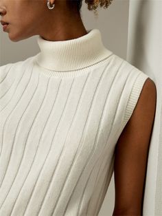 Lightweight, soft, and insulating, it features a straight fit regular hemline for a casual and minimalist look. This versatile piece looks great worn alone or layered. In a sleeveless design, it is completed with a contrasting stripe on the back, a signature of the brand for AW24. 100% Cashmere Turtleneck Sleeveless, Cashmere Turtleneck, Vest White, New Shoes, All Seasons, Looks Great, Sweaters & Cardigans, Cashmere, Turtle Neck