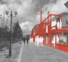 people are walking down the street in front of red and white buildings with balconies