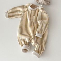 This adorable striped toddler jumpsuit is perfect for keeping your little one warm and comfortable in the spring and autumn. The long sleeves and soft cotton fabric will keep them cozy, while the striped pattern adds a touch of style. The jumpsuit is also easy to care for, just machine wash and tumble dry on low. Features: Long sleeves Striped pattern Soft cotton fabric Easy to care for Fits true to size Benefits: Keeps your little one warm and comfortable Stylish and modern design Easy to care Toddler Jumpsuit, Baby Yellow, Striped Rompers, Baby Grows, Accessories Jacket, Clothing Size Chart, Unisex Baby, Striped Long Sleeve, Green Yellow