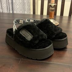 Brand New In The Box And Authentic Item. Black Platform Slides With Round Toe, Black Platform Flat Slides, Black Flat Platform Slides, Black Platform Slides In Synthetic Material, Black Platform Slip-on Slides, Black Platform Slip-on Slippers, Black Closed Toe Platform Slides, Black Open Toe Slippers For Streetwear, Trendy Black Leather Slides