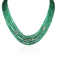 A beautiful multi-strand emerald bead necklace. This simple and stylish necklace features five strands of polished rondelle emerald beads. This necklace measures 22 inches long. The draping of this necklace allows you to see the gorgeous green color of the polished emerald rondelle beads. The beads in this necklace are graduated and get smaller towards the golden 14K clasp. Setting Style: Five Strands Setting Material: 14K Yellow Gold Main Stone: Emerald Shape: Rondelles Approx Weight: 294+ Carats (Total) Treatment: Natural Origin: Zambia A certificate of appraisal is provided upon purchase. Keep in mind we custom create all of the items listed here. If you have a special request for a custom-created item please contact us at 1 800 840 6828. Complimentary shipping within the USA. Elegant Emerald Necklace With Faceted Beads, Elegant Round Emerald Necklace With Faceted Beads, Elegant Multi-strand Beaded Necklaces With Gemstones, Elegant Multi-strand Gemstone Beaded Necklace, Elegant Faceted Briolette Emerald Necklace, Elegant Formal Emerald Necklace With Faceted Beads, Luxury Multi-strand Gemstone Beads Necklace, Elegant Emerald Necklace With Briolette Gemstone Beads, Elegant Briolette Emerald Necklace With Gemstone Beads