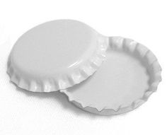 two white paper plates sitting on top of each other, one is empty and the other has no lid