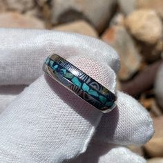 This is a USA-made comfort fit 6mm wide Damascus Steel with a rounded top profile, acid etch, and a 2-millimeter turquoise & lapis lazuli inlay. It is very comfortable to wear with a rounded comfort fit design. This ring is hand-finished & designed by jewelry artisans who have a passion for unique jewelry & uncompromising quality. 6mm Damascus steel Acid-etched 2mm center turquoise & lapis lazuli Inside comfort fit design SKU: DD-WHT-6HR12G-Turq-Lps Made In The USA Box Color May Damascus Ring, Damascus Steel Ring, Box Color, Damascus Steel, Steel Ring, Damascus, Lps, Custom Rings, Lapis Lazuli