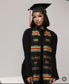 a woman wearing a graduation cap and gown