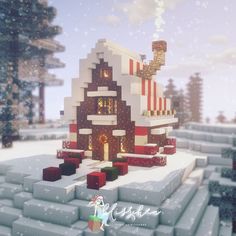 a small house made out of blocks in the snow