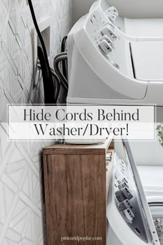 a washer and dryer sitting next to each other in a room with white tiles