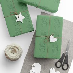 presents wrapped in green paper and tied with twine