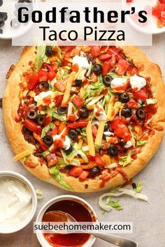 a pizza sitting on top of a pan covered in toppings