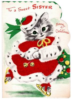 an old fashioned christmas card with a kitten on it