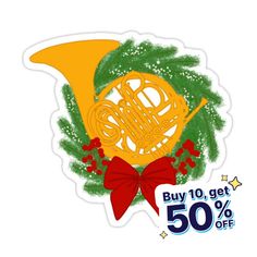 a christmas wreath with a french horn on it and the words buy 10 get 50 % off