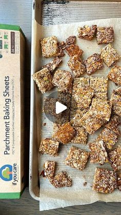 a box of granola squares next to a box of cereal bars on a table