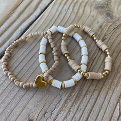 Jewelry | Gold Tan White Bracelet Stack Heishi Beads | Poshmark White Clay Bead Bracelet Ideas, Leather Chain Bracelet, Opal Cuff Bracelet, Simple Beaded Bracelets, Multi Gemstone Bracelet, Silver Cuff Bangle, White Bracelet, Alex And Ani Bracelets, Come Undone