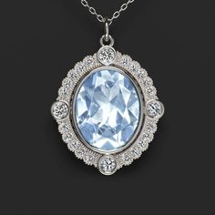 This gorgeous vintage inspired pendant features a bright blue aquamarine surrounded by an elegant scalloped diamond halo. The scalloped design and fine milgrain details gives this pendant a touch of vintage flair and an air of Art Deco glamour. The 2.28ct aquamarine is eye clean and sparkles in dazzling flashes. The blue of the aquamarine is well saturated and vibrant, reminiscent of the sky on a summer day. The accent diamonds add substantial sparkle. They are all bright white and completely ey Elegant Aquamarine Necklace, Elegant Oval Aquamarine Necklace, Elegant Oval Aquamarine Necklaces, Elegant Light Blue Oval Necklaces, Elegant Aquamarine Jewelry With Rose Cut Diamonds, Oval Aquamarine Jewelry With Diamond Accents, Classic Aquamarine Jewelry With Halo Setting, Elegant Light Blue Jewelry With Center Stone, Classic Light Blue Oval Jewelry