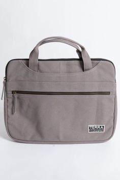 Whether you’re a minimalist who likes to do more with less, or you’re a maximalist tired of digging your laptop out of a jam-packed backpack or bag, our new Laptop Sleeve with handles will help you get a handle on staying organized and on the move. Made with 14-oz organic cotton canvas and padded with organic cotton fiber for padding and softness, our eco-friendly laptop sleeves are made to protect your machine from the jostling, grit, and abrasion of transport in a backpack or tote. Designed to New Laptop, New Laptops, Backpacking Packing, Laptop Case, Staying Organized, Laptop Sleeve, Do More, Laptop Sleeves, Cotton Fiber