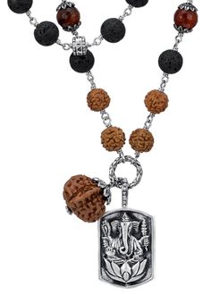 This earthy yet luxurious Ganesh mala is a symbol of strength and protection, amplified by the powerful combination of gemstones and authentically activated rudraksha, linking to a fearless path that leads to success and fulfillment. #jewelry #jewelryideas #jewelrylover #jewelryaddict #mala #bracelets #rings #earrings #necklaces #pendants #spiritualjewelry #beads #fashion #gift #jewelryoftheday #malabeads #sanskritjewelry Mala Necklace