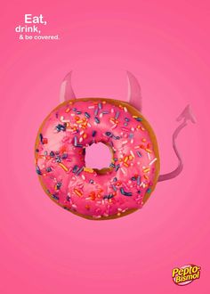 a donut with pink frosting and sprinkles