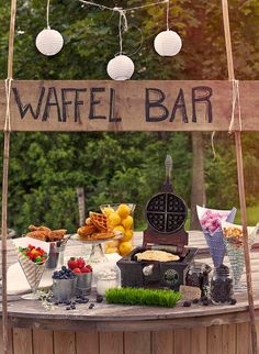 an image of a table with food on it and the words waffle bar above it