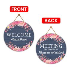 two hanging signs with the words welcome and meeting in progress, one is for each other