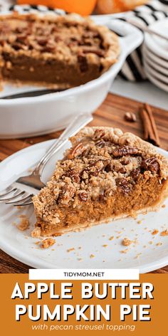 a slice of apple butter pumpkin pie on a white plate with a fork in front of it