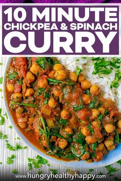 a bowl filled with chickpea and spinach curry on top of white rice