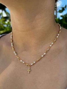 Beautiful and dainty cross necklace. Delicate tiny cross-stud earrings. Perfect gift for moms, bridesmaids, first communion, baptism, and confirmation. Details: Stud earrings dimensions: 0.25' x 0.35' Necklace length: 18 inches plus 1 inch extension. Material: 18k Gold filled 14k Gold Filled Cross Jewelry Gift, Dainty Cross Jewelry For Mother's Day, Delicate Cross Jewelry Gift, Delicate Clavicle Chain Jewelry With Cross Pendant, Delicate Clavicle Chain With Cross Pendant, Dainty Crucifix Clavicle Chain Jewelry, Elegant Hypoallergenic Cross Pendant Jewelry, Delicate Cross Pendant Jewelry With Chain, Delicate Gold Cross Jewelry