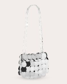 A nod to Rabanne's iconic, inaugural aesthetic, this pliable bag is comprised of mirrored silver discs bonded together by little metal rings. Smaller in stature, this nano bag is perfect for eveningwear occasions.Chain link strapSilver-tone hardwareMirrored silver discsMetal ring bonding90% polyester, 10% brassClean with soft clothMade in Madagascar Measurements Width: 6.29in Height: 4.92in Depth: 0.98in Modern Metallic Party Bag, Modern Metallic Party Bags, Modern Metallic Silver Party Bags, Chic Metallic Silver Party Bags, Modern Silver Party Bags, Luxury Metallic Silver Bags For Party, Luxury Metallic Silver Party Bag, Luxury Metallic Silver Party Bags, Modern Silver Evening Bag With Silver-tone Hardware