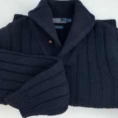 Rare Polo By Ralph Lauren Classic Chunky Shawl Collar Pullover Sweater 100% Wool Size: Large Leather Button Detail Measure: Shoulder To Shoulder: 19 Inches Shoulder To Hem: 27 Inches Armpit To Armpit: 24 Inches Pre-Owned, Great Condition Winter Fitted Polo Sweater With Buttons, Winter Fitted Button Polo Sweater, Fitted Polo Sweater With Buttons For Winter, Classic Navy Sweater With Button Closure, Classic Fitted Blue Polo Sweater, Fitted Classic Blue Polo Sweater, Fitted Blue Classic Polo Sweater, Navy Classic Sweater With Buttons, Blue Wool Sweater With Buttons