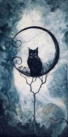 a black cat sitting on top of a crescent moon