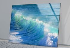 an ocean scene is displayed on the wall