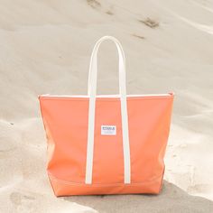 Step out in style with our stunning Orange Steeletex Zip Top Beach Tote. Crafted from durable vinyl, this chic tote is both water and tear-resistant, ensuring it stays pristine with minimal effort. The elegant 10" handle drop allows you to carry it over your shoulder effortlessly, freeing your hands, so you can do things like sending quick texts and enjoying your coffee. Featuring a zippered top and an interior pocket, this tote keeps your essentials secure and organized, making it the perfect a Beach Tops, Beach Tote, Personalized Products, Zip Top, Instagram Followers, You Can Do, Texts, Product Launch, Vinyl