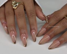 Glam Nails Almond Shape, French Manicure Designs With Gold, Almond Nails Gold French Tip, Almond Nails With Gold Tips, Gold French Manicure Almond, Gold French Tips Almond, Acrylic Nails With Gold Design, Gold Almond French Tip Nails, Almond Gold French Tip Nails